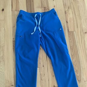 FIGS sized medium royal blue scrub pants.  Excellent condition.